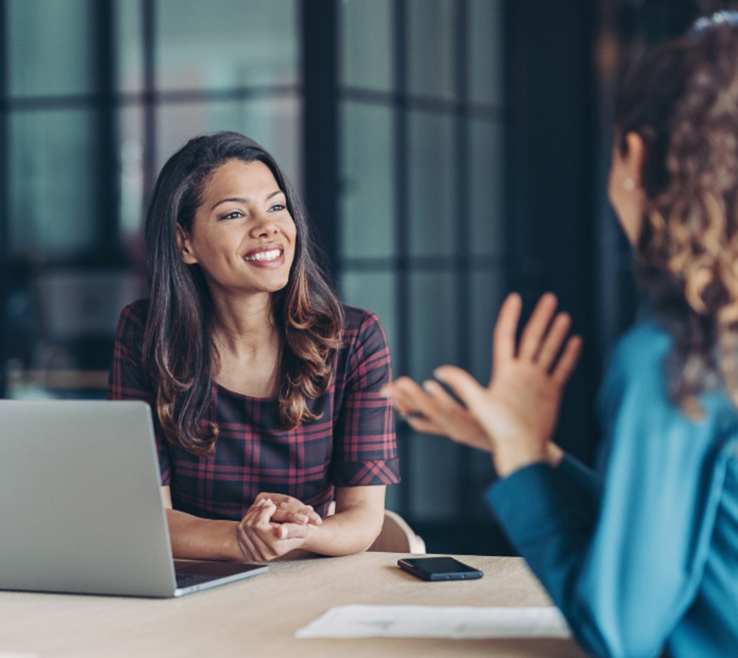 happy woman in a meeting